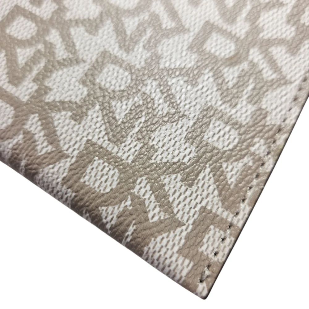 DKNY Bryant Park Logo Wristlet Pouch Cosmetic Bag Beige & Brown Faux Leather